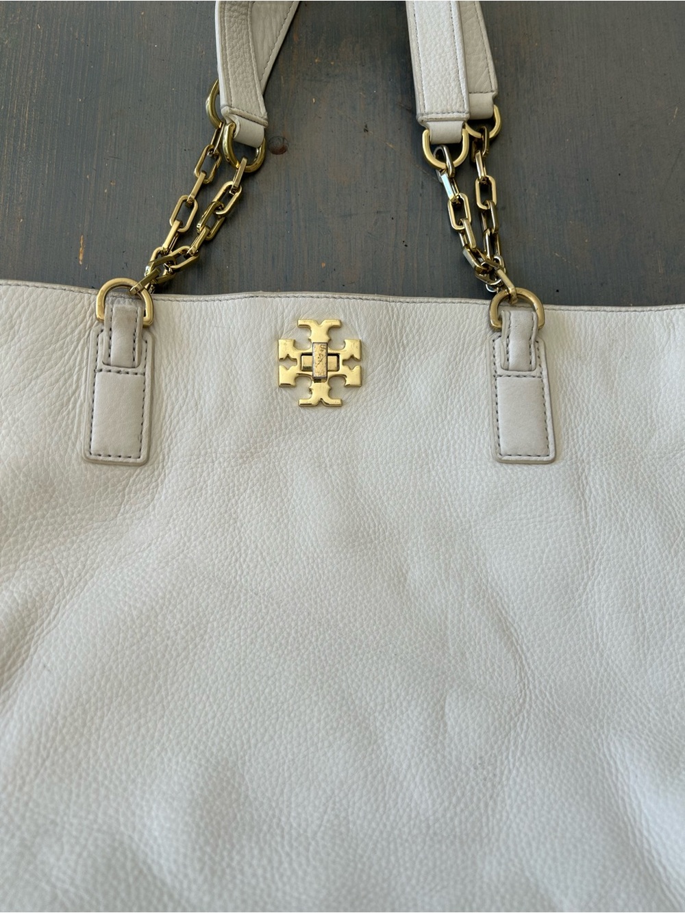Tory Burch white pebbled leather quality tote 
Super pre loved condition ~ signs